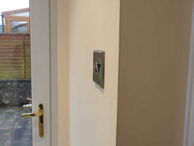 Varilight satin chrome 2-gang light switch.