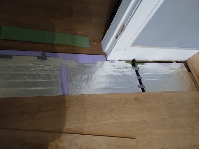 Underfloor heating in progress.