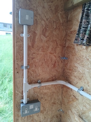Conduit wiring in shed.